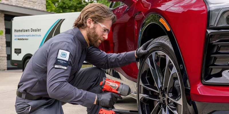 Close up of Technician working on tire